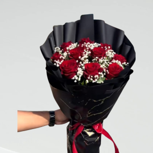 red roses with a white small flowers